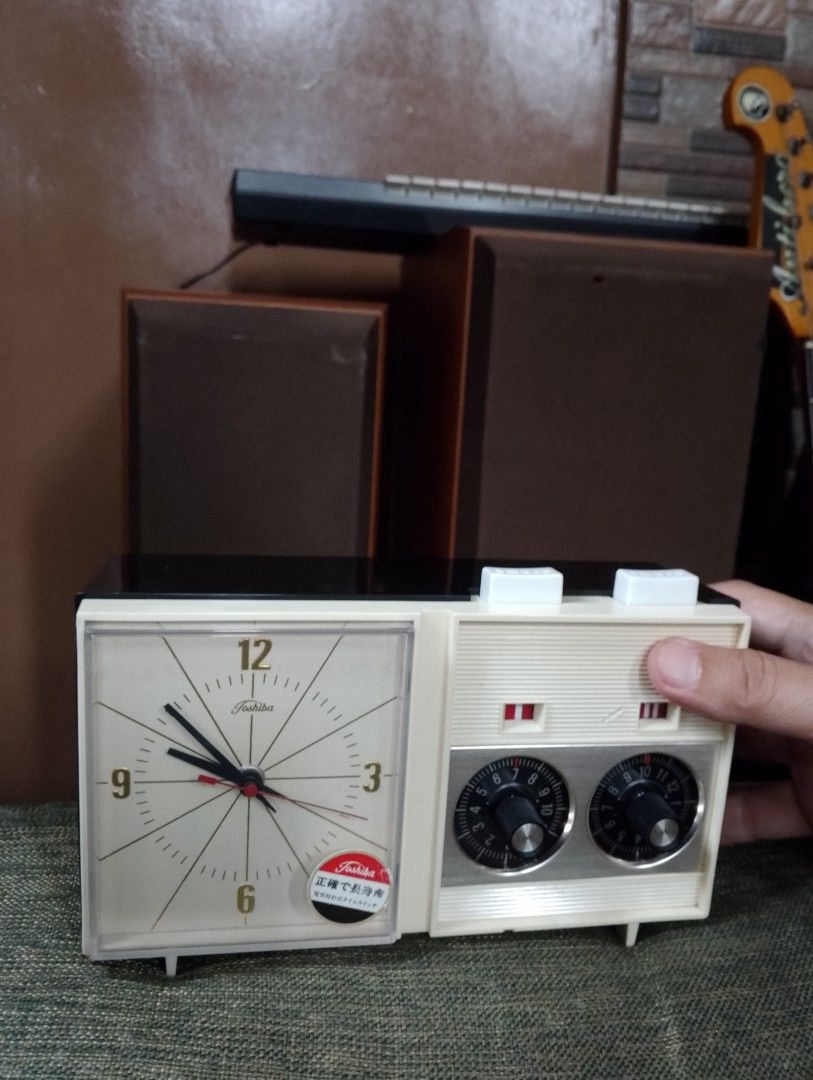 Vintage Toshiba Clock Analog Manual Timer Switch (Category: Clocks) located in Binangonan. Submitted by stufflikedat (Listing ID 1456624800, Image 3). Description: Vintage boobtube design Toshiba Time Switch (Model TWM-603) from the Showa era. It is a mechanical audio & appliance timer with an analog clock. You can plug appliances into the back and set the dials to automatically turn them on or off at specific times, both timers & clock with swee
