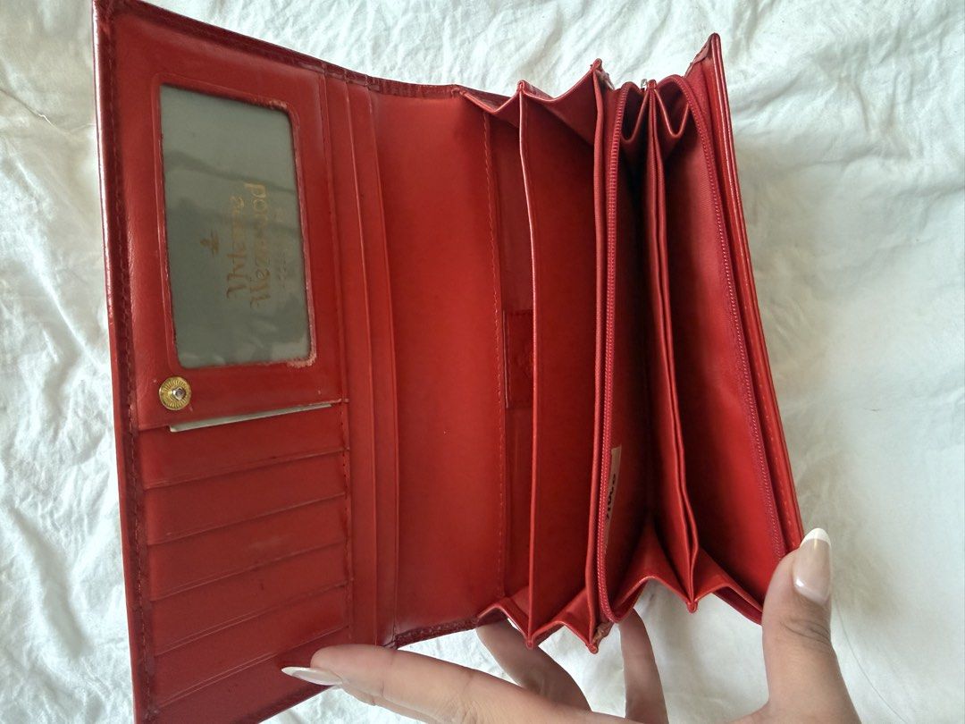 Vivienne Westood red patent wallet (Category: Luxury Bags & Wallets) located in Davao. Submitted by hirondelle.ph (Listing ID 1456633944, Image 3). Description: From Japan Guaranteed Authentic .