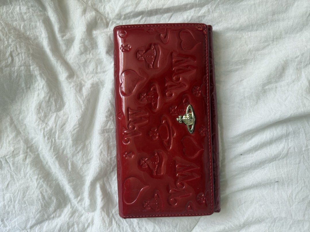 Vivienne Westood red patent wallet (Category: Luxury Bags & Wallets) located in Davao. Submitted by hirondelle.ph (Listing ID 1456633944, Image 1). Description: From Japan Guaranteed Authentic .