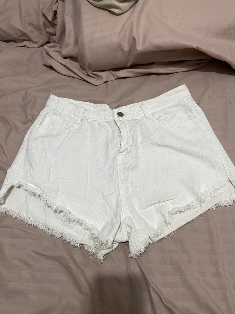 White denim short (Category: Shorts) located in Rizal. Submitted by julsdeclutterss (Listing ID 1456639127, Image 1). Description: Size 28-29.