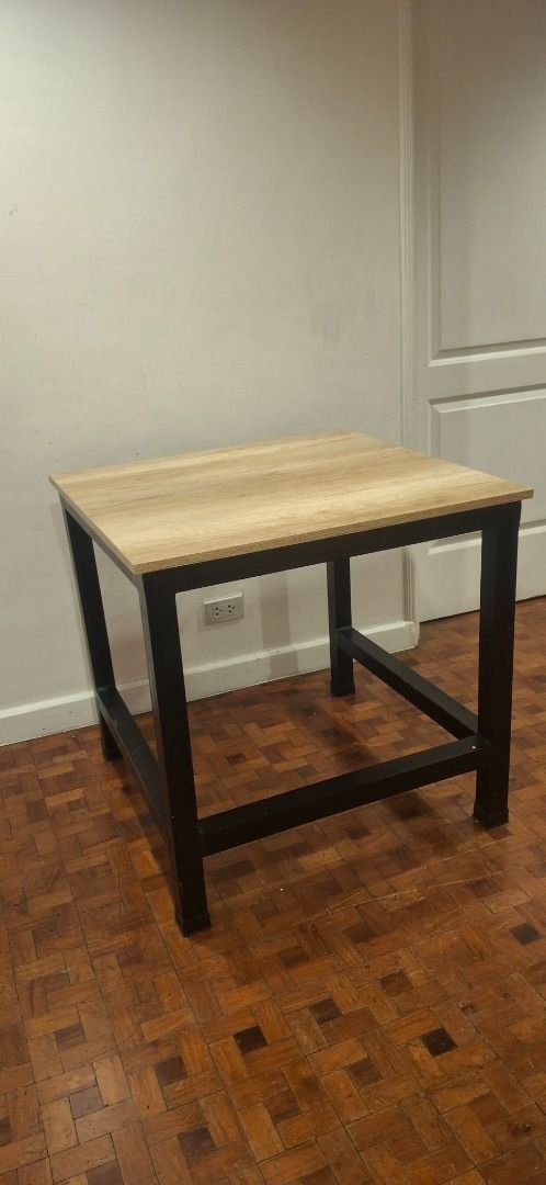 Wooden Top Working Table with Black Metal Frame (Category: Tables & Sets) located in Quezon City. Submitted by nika_ballesteros (Listing ID 1456645645, Image 2). Description: Working Table We fabricated it Depth: 78 cm Height: 75 cm Size: 78x78x75 cm Php 1,700.00 Condition: 8/10 RFS: Too many tables already Pick up location: UP Village Diliman QC Delivery fee c/o buyer.