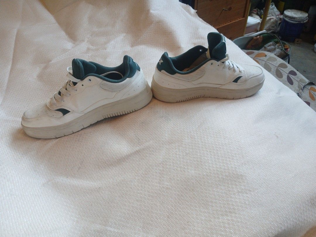 XTEP Classic White and Green Sneakers (Category: Sneakers) located in Manila. Submitted by bonifacioc73501 (Listing ID 1456639971, Image 3). Description: - White and green XTEP sneakers - Classic low-top style - Lace-up closure - Perfect for everyday wear - Shows some signs of use on soles and edges (please check photos for details).