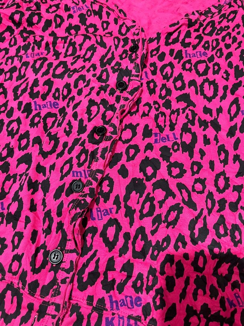 Y2K Hell Cat Punks Long Sleeves (Category: Longsleeves) located in Zamboanga. Submitted by archivist_ (Listing ID 1456738864, Image 3). Description: - Y2K Hell Cat Punks long-sleeved top - Vibrant hot pink and black leopard print - Features 'Hell Cat Punks - Not Dead @ Original' branding - Size: Large (L) - Lightweight and comfortable fabric - Perfect for a retro, edgy style.