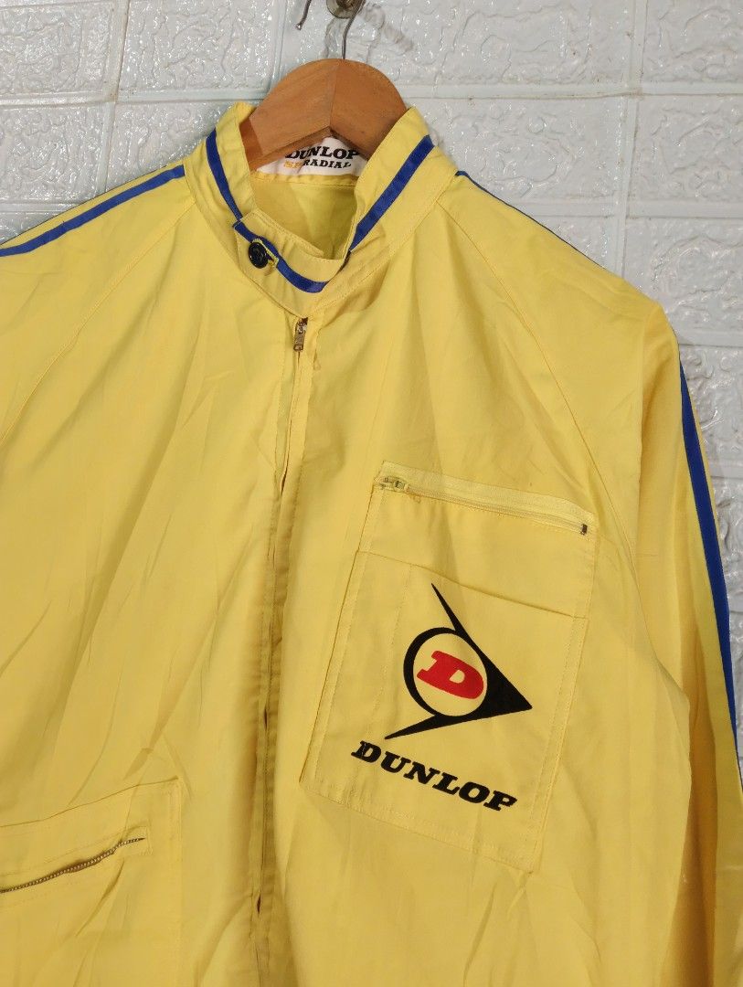 Yellow Dunlop SP Radial Racing Jacket (Category: Coats, Jackets and Outerwear) located in Davao. Submitted by noelamihan05424 (Listing ID 1456614082, Image 3). Description: - Cool yellow jacket with Dunlop SP Radial branding. - Features blue stripes on the sleeves and collar. - Has front pockets. - Perfect for Dunlop fans or a retro racing look. - Size X on tag. - Best fit Large to XL - Dimes 22x27 - Color rate 10/10 - No issue .