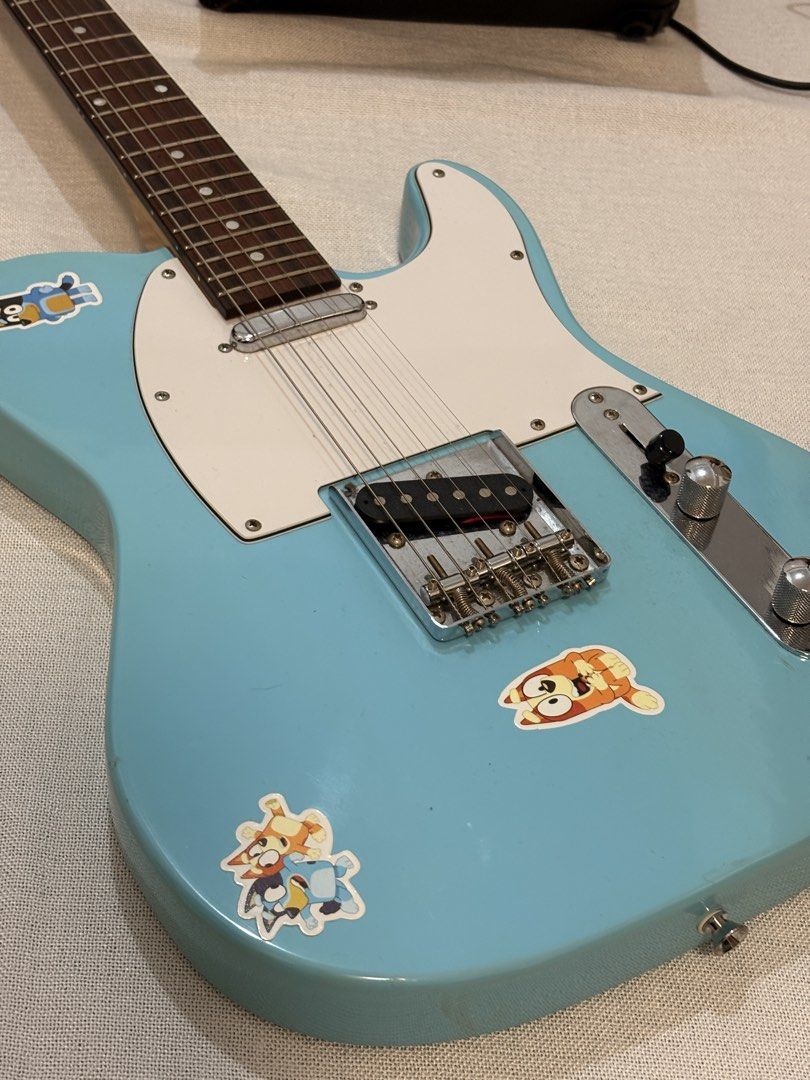 Zoomcaster (Light Blue) Guitar Set (Category: Musical Instruments) located in Manila. Submitted by ianprltsl87436 (Listing ID 1456775376, Image 2). Description: Hello! I'm selling my RJ Zoomcaster as a set with an amplifier, the cord, and an M-WAVE pedal. - Light blue Telecaster-style electric guitar - Adorable stickers on the body - Harbinger GM-215 practice amplifier - Mooer Mini Universe effects pedal - All items pictured included - Ideal star