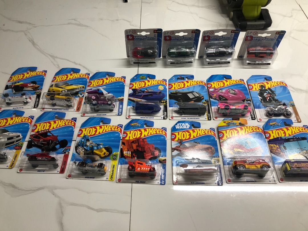 14 pcs Hotwheels 4 pcs Burago (for take all) (Category: Vehicle & Diecast Models) located in Las Pinas. Submitted by nekomiko1989 (Listing ID 1456888982, Image 1). Description: 1500 lang po yan lahatan na see pictures po sa mga cars Location: LASPINAS CITY.