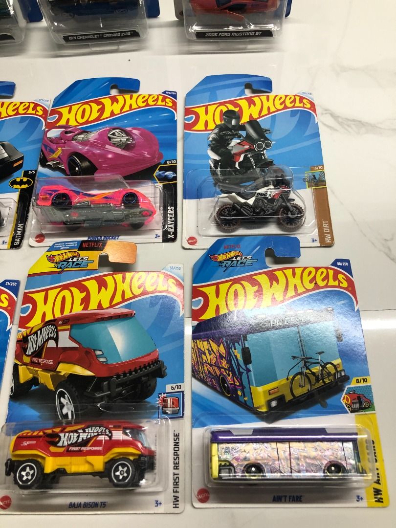 14 pcs Hotwheels 4 pcs Burago (for take all) (Category: Vehicle & Diecast Models) located in Las Pinas. Submitted by nekomiko1989 (Listing ID 1456888982, Image 2). Description: 1500 lang po yan lahatan na see pictures po sa mga cars Location: LASPINAS CITY.