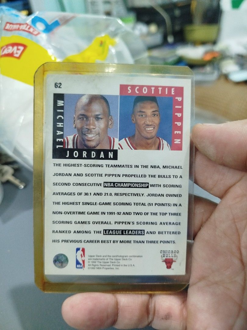 1992-93 Upper Deck Michael Jordan Scottie Pippen Card (Category: Raw Singles) located in Subic. Submitted by regiedaniel01 (Listing ID 1456866023, Image 2). Description: - 1992-93 Upper Deck Basketball Card - Features Michael Jordan and Scottie Pippen - 'Scoring Threats' on the front - Player stats and info on the back - Perfect collectible for Chicago Bulls fans - Card is in a protective sleeve - add sf 100 .