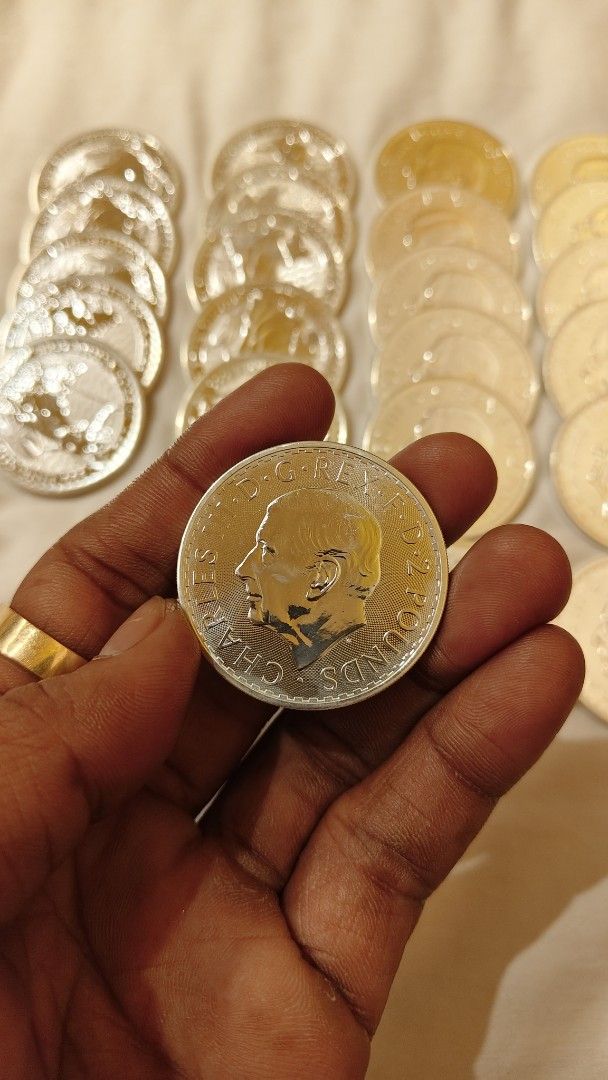 1oz Silver Britannia & King Charles III Coins (Category: Currency) located in Manila. Submitted by your_store110987 (Listing ID 1456877409, Image 3). Description: - Authentic 1oz Silver Britannia Coins - Features the iconic Britannia design - Showcases the portrait of King Charles III - Some coins are dated 2023 - Ideal addition to any coin collection - Please refer to the provided photos for detailed condition 25 PCs avail 5700 each.