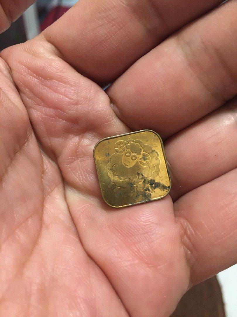 2003 Square Coin Token with Sheep Design (Category: Currency) located in Pasay City. Submitted by gilbertso62551 (Listing ID 1456914181, Image 2). Description: - Year 2003 metal token - Features a cute sheep design on one side - Made of metal (likely brass or alloy) - Perfect for collectors or as a unique keepsake - As is,where is - Needs cleaning .