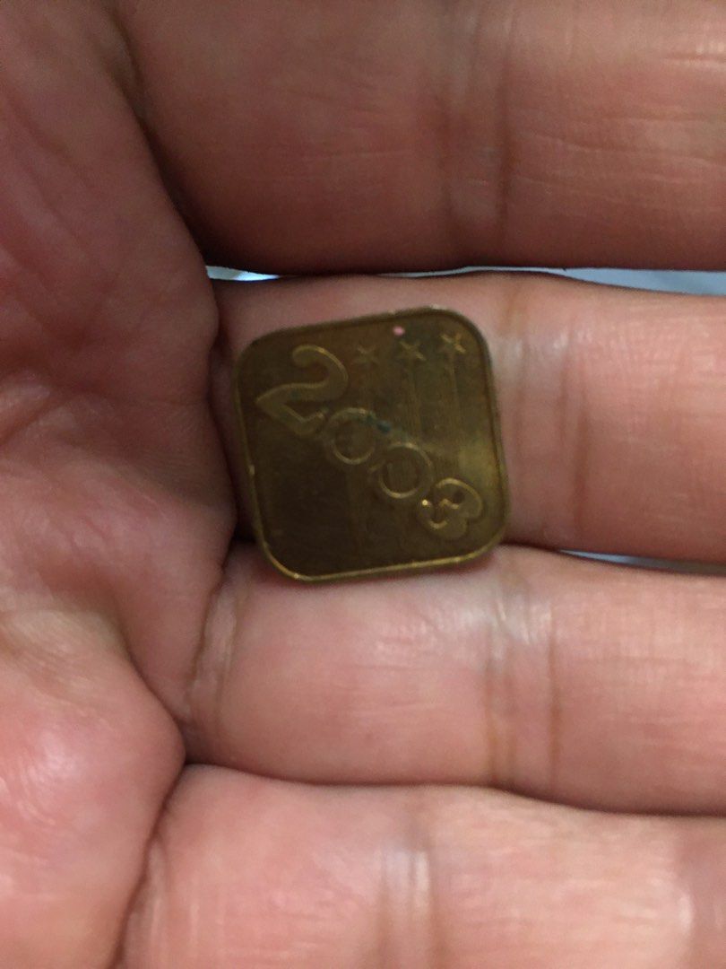 2003 Square Coin Token with Sheep Design (Category: Currency) located in Pasay City. Submitted by gilbertso62551 (Listing ID 1456914181, Image 3). Description: - Year 2003 metal token - Features a cute sheep design on one side - Made of metal (likely brass or alloy) - Perfect for collectors or as a unique keepsake - As is,where is - Needs cleaning .