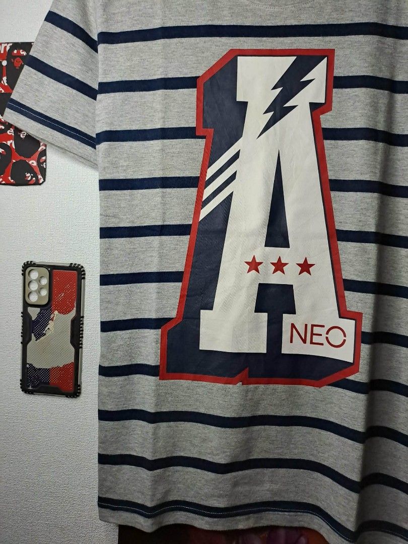 Adidas Neo for Women (Category: Shirts) located in Manila. Submitted by yaseen__73 (Listing ID 1456951565, Image 3). Description: Grey and navy blue striped Adidas Neo short-sleeve t-shirt features a bold white and red "A NEO" graphic applique on the front Wearing Size : S - M Dimensions : See Photo CR : 9.5/10 With Washable Stain Issue (See Last Photo) Condition : 4.9/5 🔥🔥🔥🔥 Pre - Owned 🔥 🔥 🔥 🔥 300.00 Shipped Via J&T 🚛 or Pick - Up Via 