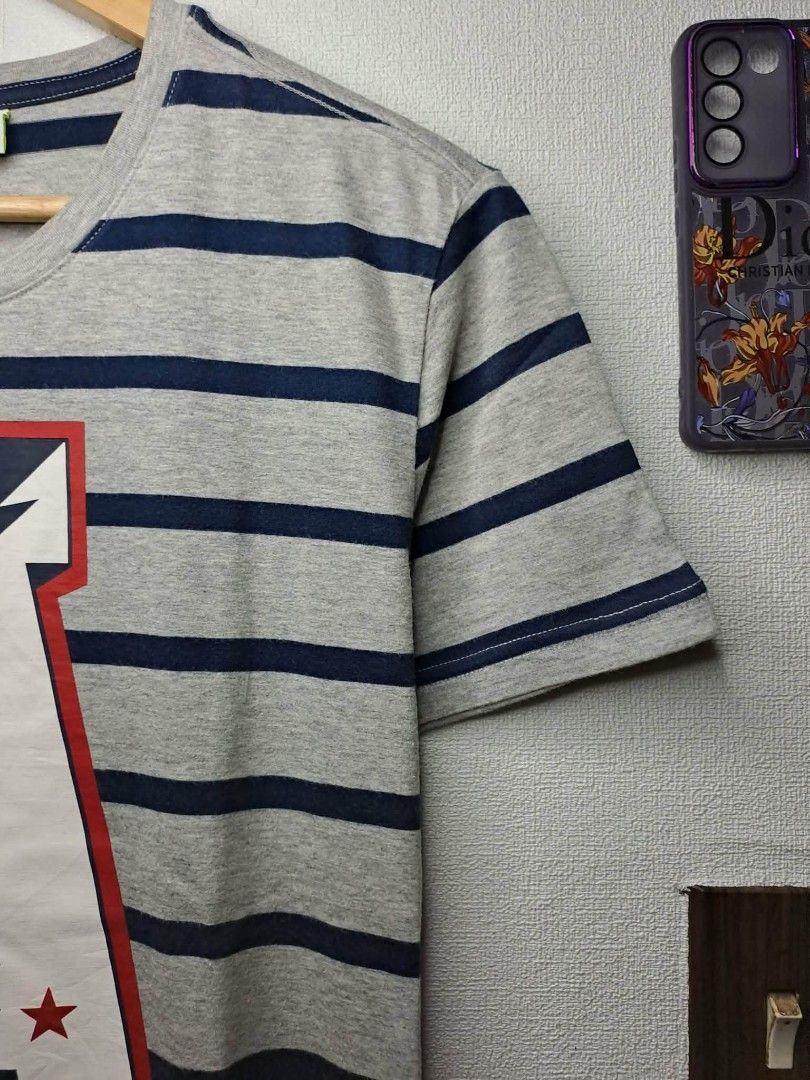 Adidas Neo for Women (Category: Shirts) located in Manila. Submitted by yaseen__73 (Listing ID 1456951565, Image 2). Description: Grey and navy blue striped Adidas Neo short-sleeve t-shirt features a bold white and red "A NEO" graphic applique on the front Wearing Size : S - M Dimensions : See Photo CR : 9.5/10 With Washable Stain Issue (See Last Photo) Condition : 4.9/5 🔥🔥🔥🔥 Pre - Owned 🔥 🔥 🔥 🔥 300.00 Shipped Via J&T 🚛 or Pick - Up Via 