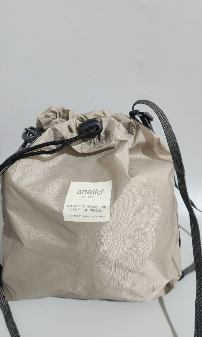 ANELLO POKEPA SACOCHE | Light Gray (Category: Cross-body Bags) located in Baguio. Submitted by ysaaabiz (Listing ID 1456781214, Image 2). Description: Anello Pokepa Sacoche - Made with lightweight, water-repellent material - drawstring closure - can be used as a sling or a mini backpack.