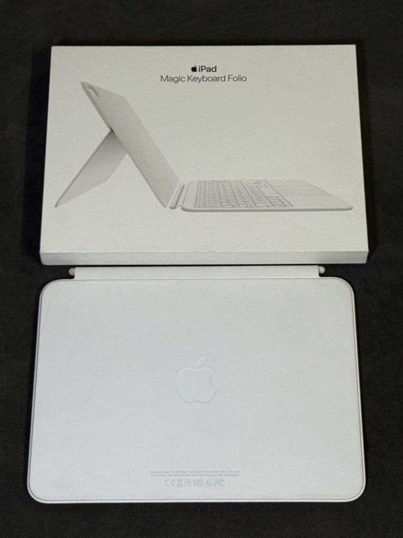Apple iPad Magic Keyboard Folio (Category: Computer Keyboard) located in Urdaneta. Submitted by myriville (Listing ID 1456802298, Image 2). Description: - Apple Magic Keyboard Folio for iPad - Folio style with integrated keyboard and trackpad - Magnetic attachment to your iPad - Enhances typing and navigation experience - Comes with original packaging - Feel free to ask any questions! Purchased: April 2026 RFS: Upgraded to Macbook.