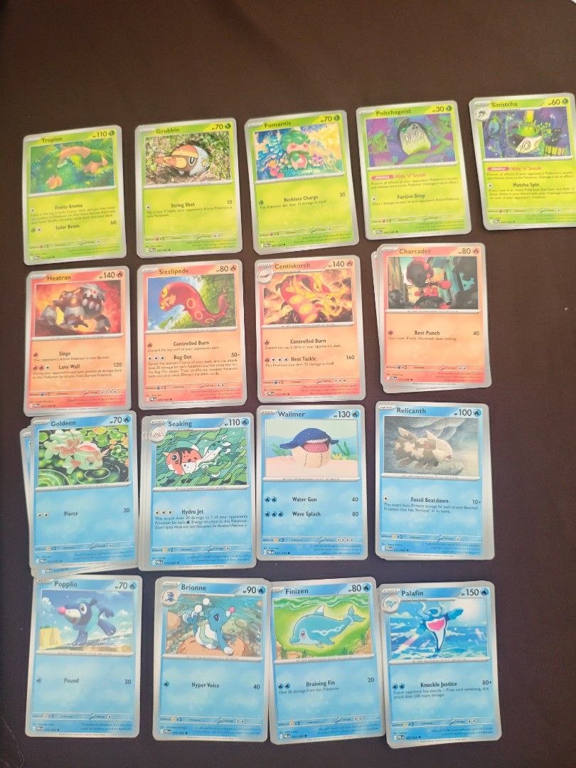 Assorted Pokemon Cards - Pitch black - Common, Uncommon (Category: Raw Singles) located in Guiguinto. Submitted by pic_a (Listing ID 1456857920, Image 1). Description: - Collection of Pokemon cards available. - Includes Grass, Fire, Water, and Electric types. - Notable Pokemon featured: Charcadet, Centiskorch, Wailmer, Relicanth, Palafin, and Heatran. - Ideal for both collectors and players. - All cards shown in the provided images are included..