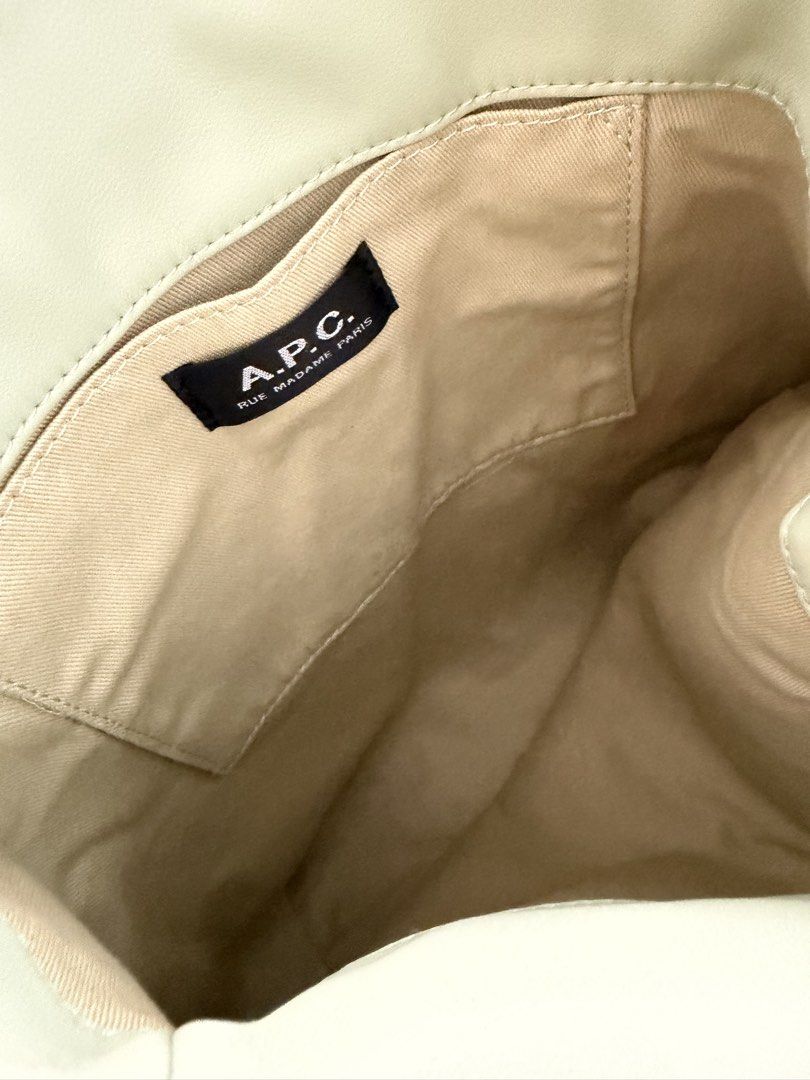 Authentic A.P.C. Tote Ninon Small Vert Amande Bag (Category: Luxury Bags & Wallets) located in Taguig. Submitted by claire08hyun (Listing ID 1456832971, Image 3). Description: - A.P.C. tote bag - Color: Light green (Vert Amande) - Size: Small - Features an interior pocket - Comes with original tags - Ideal for everyday use.