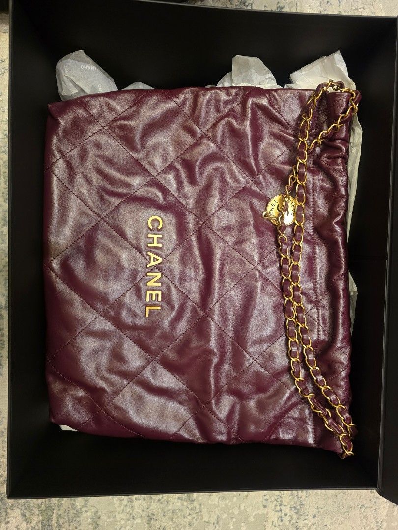 Authentic Chanel 22 Burgundy Quilted Leather Chain MEDIUM (Category: Luxury Bags & Wallets) located in Muntinlupa City. Submitted by mythingsph (Listing ID 1456873217, Image 1). Description: FOR SALE: AUTHENTIC CHANEL 22 LARGE – BURGUNDY Selling my 100% Authentic CHANEL 22 Large Handbag in a beautiful deep Burgundy / Wine shade with Gold-Tone Hardware. A statement Chanel piece that still feels understated and luxurious. The rich burgundy color is