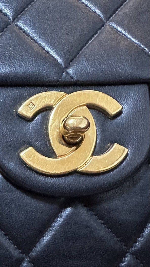Authentic Chanel Backpack Turn Lock Flap Lambskin (Category: Luxury Bags & Wallets) located in Las Pinas. Submitted by marshmallowmax (Listing ID 1456797738, Image 3). Description: Guaranteed Authentic! Still in excellent condition. No flaws No tarnish No bag spa Comes with dustbag and papers only lost card Size: W24 H22 D8 CM.