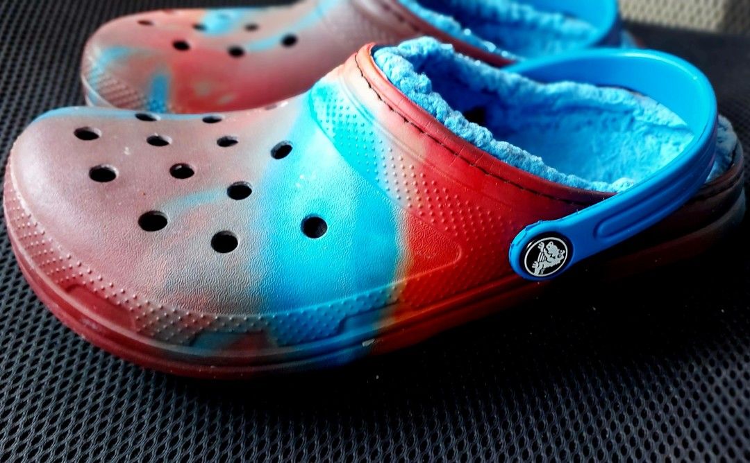 AUTHENTIC Crocs Lined Clogs Tie-Dye Blue Red (Category: Babies & Kids Fashion) located in Quezon City. Submitted by gachrie (Listing ID 1456808213, Image 2). Description: -authentic. bought in the US. used during the winter. - Cozy lined Crocs in a cool red, blue, and brown tie-dye pattern. - Features a warm, fuzzy blue lining for ultimate comfort. - Easy slip-on design, perfect for lounging or quick errands. - Versatile strap can be flipped back