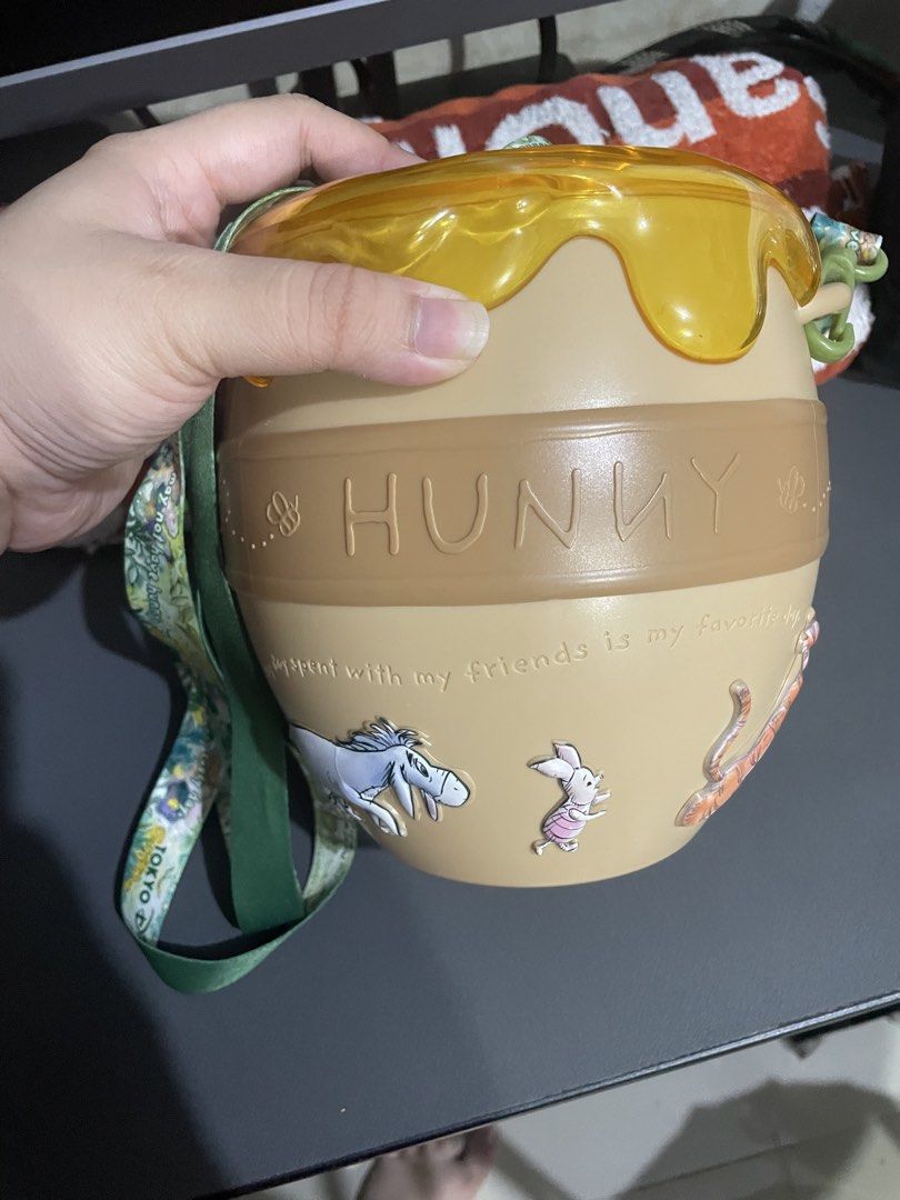 Authentic Disney Winnie the Pooh Popcorn Bucket (Category: Character Goods) located in Manila. Submitted by prelovedpicksph (Listing ID 1456949251, Image 2). Description: — in good condition, no flaws — authentic Tokyo Disneyland Winnie the Pooh Honeypot Popcorn Bucket — features Winnie the Pooh on top of the bucket.