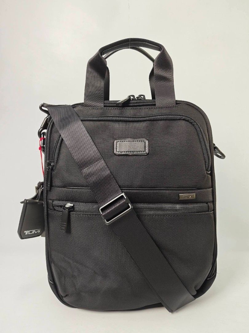 Authentic Tumi MEDIUM Black Nylon Crossbody Bag (Category: Sling Bags) located in Quezon City. Submitted by hollowwillow (Listing ID 1456866298, Image 1). Description: - authentic and brand new Medium P3,900 canvas P4,700 leather.
