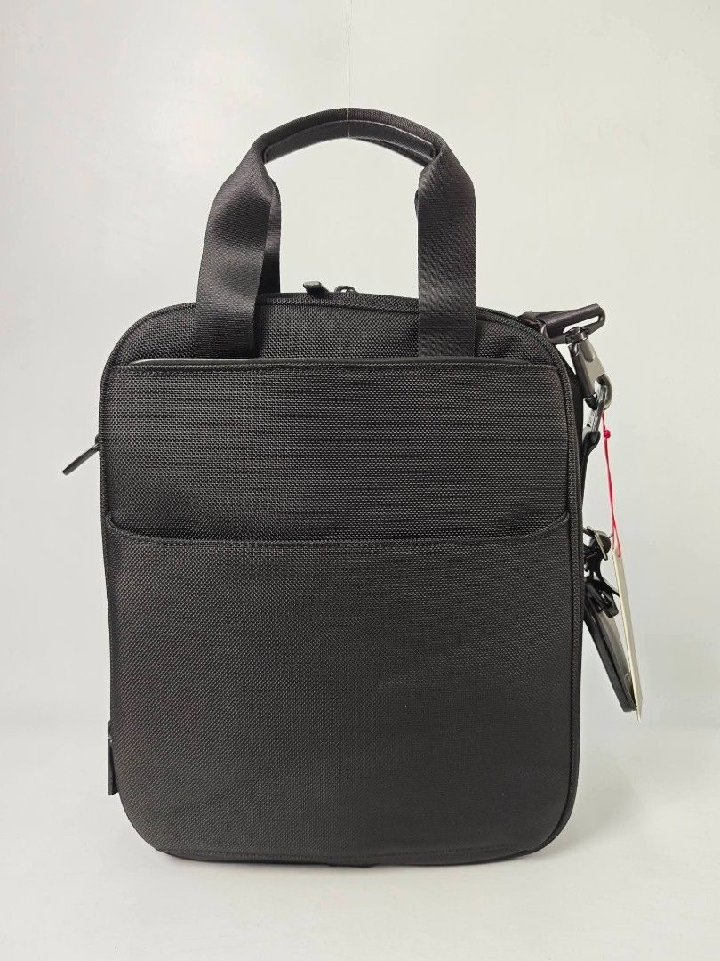 Authentic Tumi MEDIUM Black Nylon Crossbody Bag (Category: Sling Bags) located in Quezon City. Submitted by hollowwillow (Listing ID 1456866298, Image 3). Description: - authentic and brand new Medium P3,900 canvas P4,700 leather.