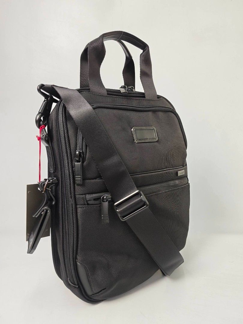 Authentic Tumi MEDIUM Black Nylon Crossbody Bag (Category: Sling Bags) located in Quezon City. Submitted by hollowwillow (Listing ID 1456866298, Image 2). Description: - authentic and brand new Medium P3,900 canvas P4,700 leather.