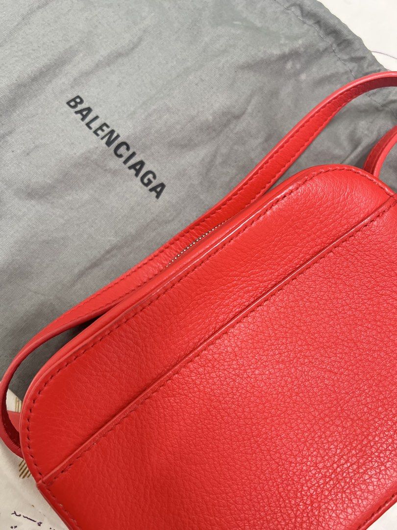 Balenciaga Camera Bag Red (Category: Luxury Bags & Wallets) located in Malolos. Submitted by nutellahxx (Listing ID 1456816436, Image 3). Description: STILL LOOKING FOR THE CARD. I MISPLACED IT. Bought it in US. 100% Authentic. You can check it thoroughly pag meet up or even get it tested. Thanks! Can do swap to Ipad Pro M4 and up. I can add cash Location: The Linear Makati or Malolos Bulacan.