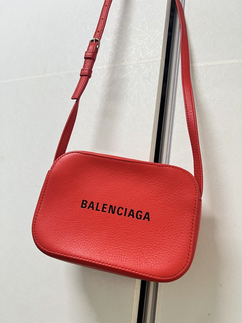 Balenciaga Camera Bag Red (Category: Luxury Bags & Wallets) located in Malolos. Submitted by nutellahxx (Listing ID 1456816436, Image 1). Description: STILL LOOKING FOR THE CARD. I MISPLACED IT. Bought it in US. 100% Authentic. You can check it thoroughly pag meet up or even get it tested. Thanks! Can do swap to Ipad Pro M4 and up. I can add cash Location: The Linear Makati or Malolos Bulacan.