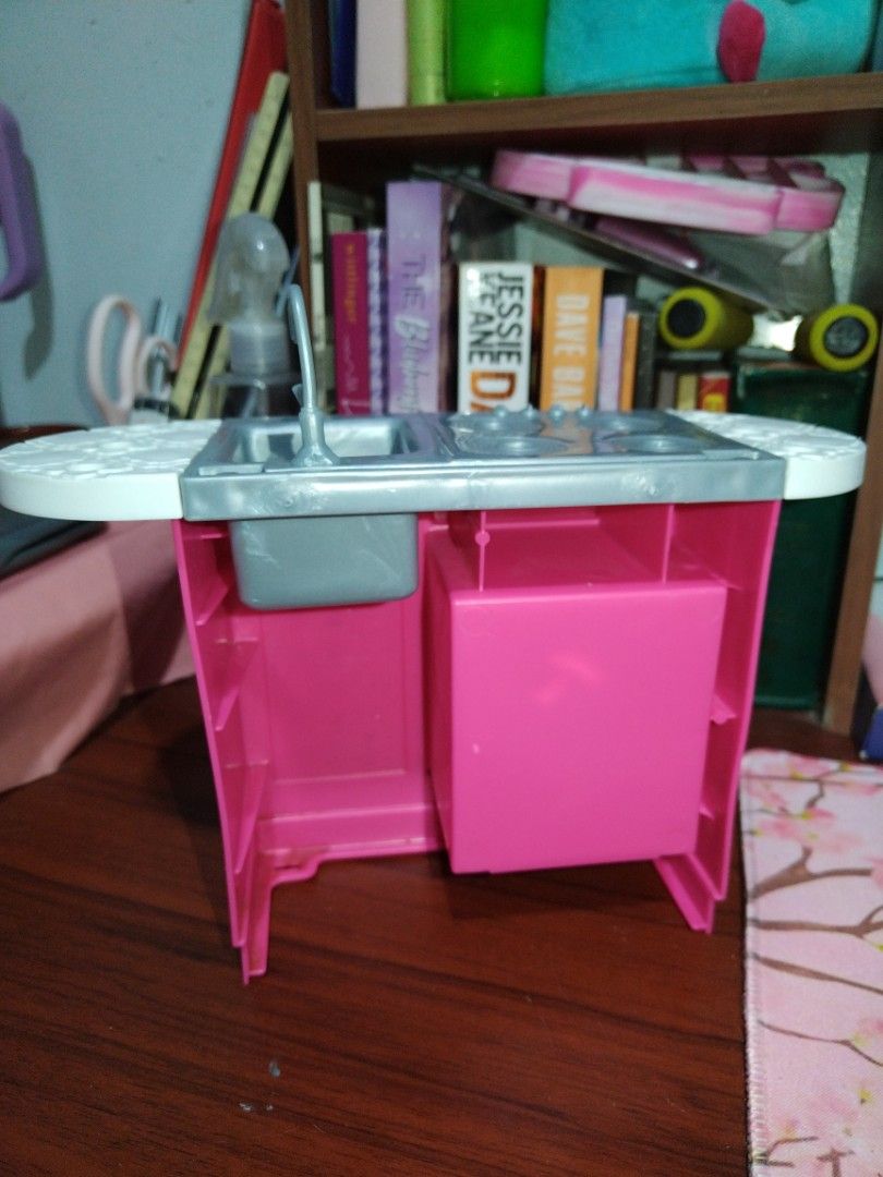 Barbie Doll Kitchen Preloved (Category: Kids Toys) located in Paranaque City. Submitted by KiwiyaDecluts (Listing ID 1456868990, Image 3). Description: Missing po yung top part and mga utensils. Still in working condition pero may yellow paint beside the oven as seen on the picture.