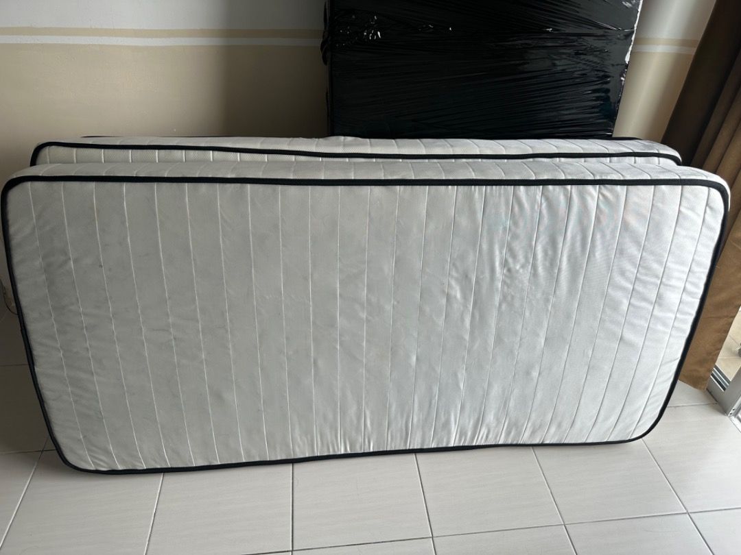 Basic Mattress (Category: Bed Frames & Mattresses) located in Kuala Lumpur. Submitted by tengfamily48016 (Listing ID 1456824065, Image 2). Description: - Two white mattresses with black trim - Ideal for spare room or guest bed - Clean and ready for a new home - Pick up only -if buy two the price is cheaper -Can nego -Condition 7/10.
