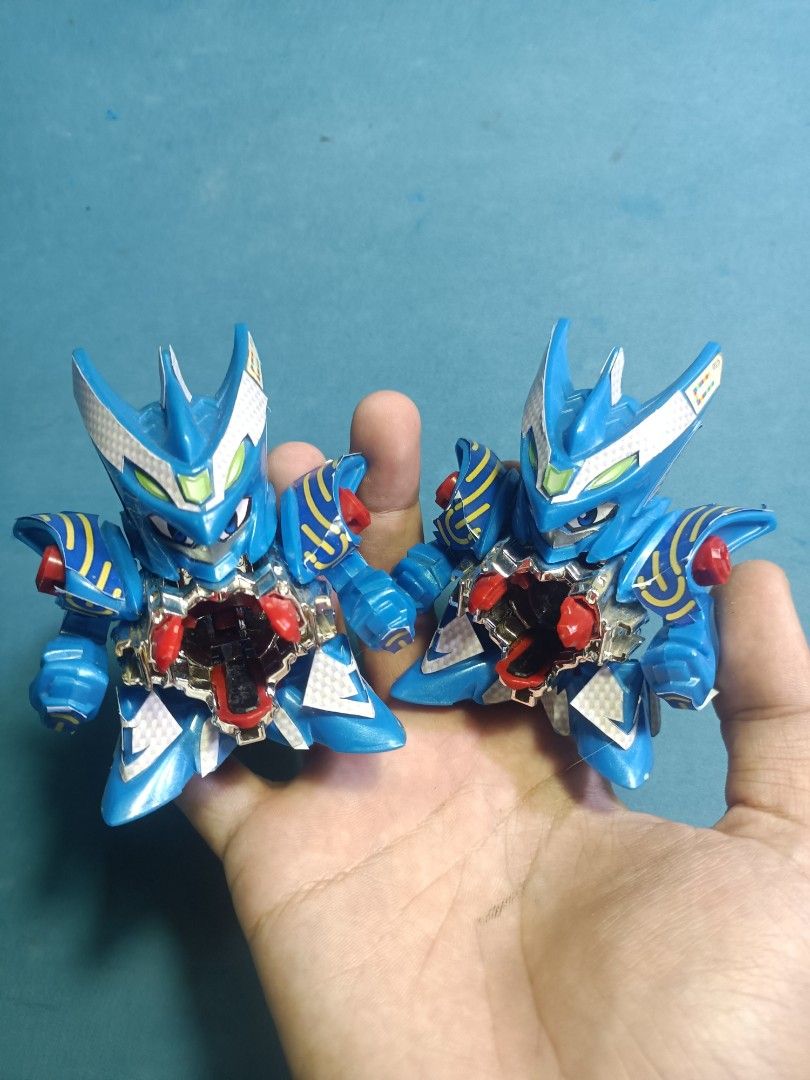 Battle and Crossfight B-Daman (Category: Action & Battle Toys) located in Los Banos. Submitted by lemuel_02 (Listing ID 1456936892, Image 2). Description: Accel Leon-2000 Lord Cavalry-2500 Cobalt Blade-SOLD Cobalt Blaster (3D print holder and issue in cartridge, but can still hold)-4000 Cobalt Sword + DHB Armor-5000 Accel Dracyan-1500 Gatling Deathshell-SOLD Slot Beedle-1200 Spin Leo-800 Gold Twin Drazeros-2500 . Mostly are in Excellent condition