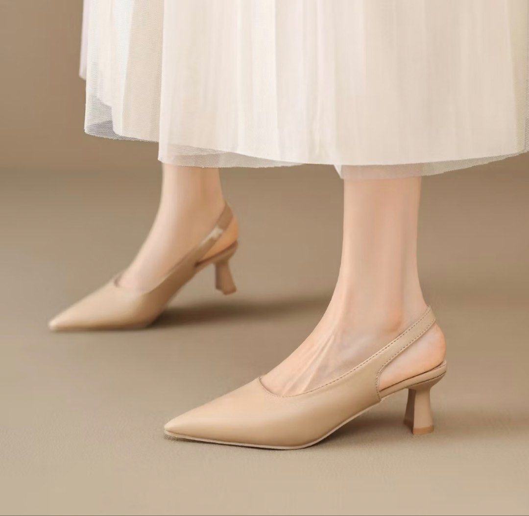 Beige Slingback Pointed Toe Heels (Category: Heels) located in Muntinlupa City. Submitted by urxyy (Listing ID 1456804943, Image 3). Description: - Beige slingback heels - Pointed toe - Low heel - Comfortable elastic slingback strap - Versatile color for various outfits - Ideal for work or casual outings.