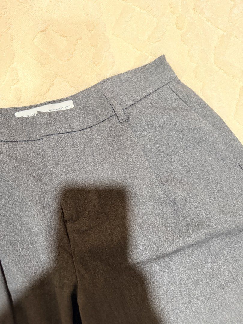 Bershka Grey Tailored Trousers Size 4 (Category: Other Bottoms) located in Quezon City. Submitted by deedee12920 (Listing ID 1456838383, Image 2). Description: - Bershka Grey Tailored Trousers - Made in Turkey - Size: EUR 36 / USA 4 / MEX 26 - Classic fit - Features belt loops and back pockets - Versatile for work or casual outfits - Easy to match with various tops - Reason for selling: No longer fits - L 102cm - can fit 28-30 waist.