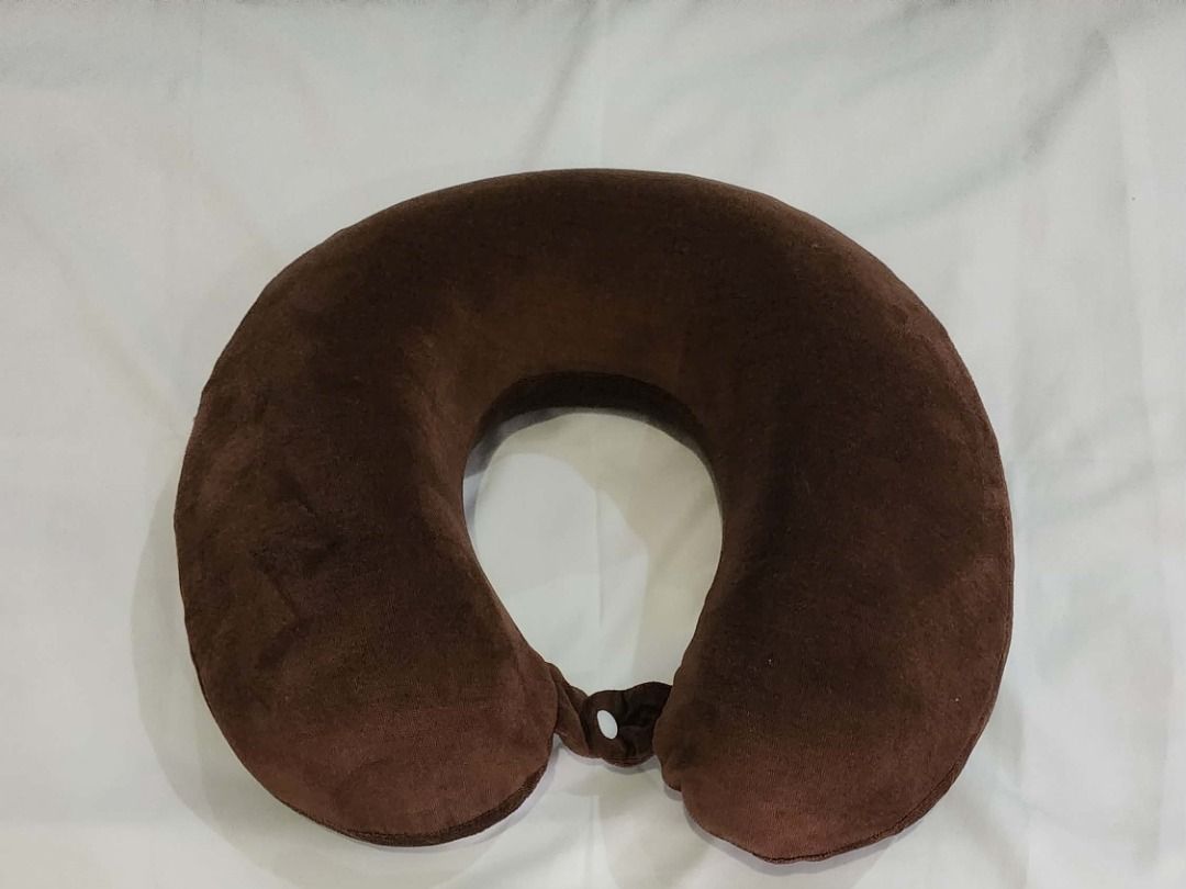 Mandaue Brown Travel Neck Pillow (Category: Travel Essentials & Accessories) located in Cainta. Submitted by paupc1234 (Listing ID 1456852363, Image 1). Description: - Authentic Mandaue Foam plush travel neck pillow - Ergonomic U-shape design with front snap button closure for full neck support - Soft, comfortable plush cover ideal for long trips, flights, or quick naps - Condition: Used / Like New (Clean, well-maintained, no flaws) - RFS: Declut