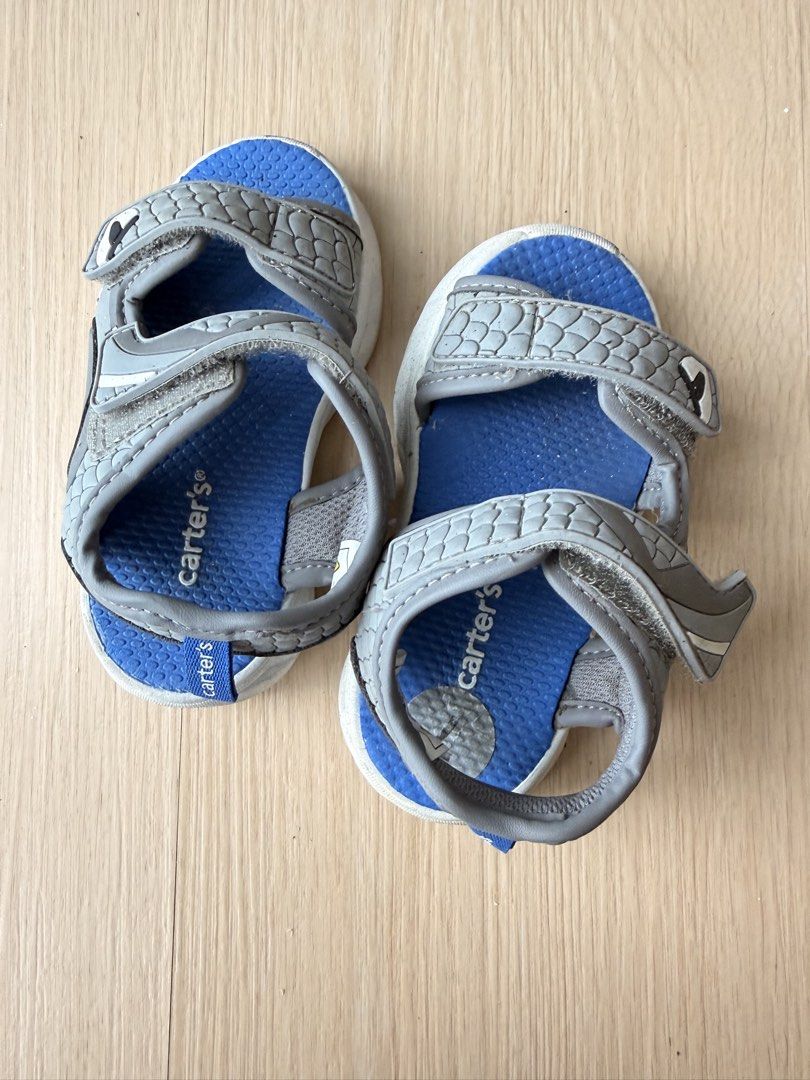 Carter's Kids Shark Sandals Size 7 (Category: Babies & Kids Fashion) located in San Pedro. Submitted by tabacheengcheeng (Listing ID 1456780764, Image 2). Description: - Brand: Carter's - Size: 7kids - Color: Blue and Grey - Design: Fun shark on the side - Closure: Easy velcro straps - Features: Good grip soles - Ideal for: Summer adventures Nailaw .