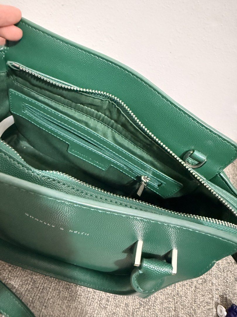 Charles & Keith Trapeze top handle bag (ORIGINAL) (Category: Luxury Bags & Wallets) located in Manila. Submitted by mcstr24 (Listing ID 1456905732, Image 3). Description: Selling my C&K trapeze hand bag RFS: di na ginagamit Bought it at Oman for 47 OMR (7500 PHP) *di pa natanggal price tag (used twice) Selling it for only 2k‼️.