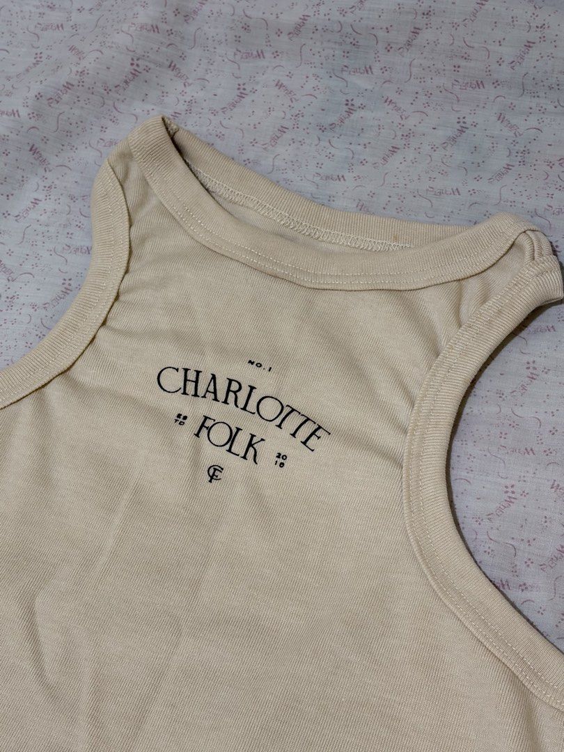 Charlotte Folk Tank Top (Category: Sleeveless) located in Quezon City. Submitted by https_prncss (Listing ID 1456781032, Image 2). Description: Never been used. RFS: Too small.