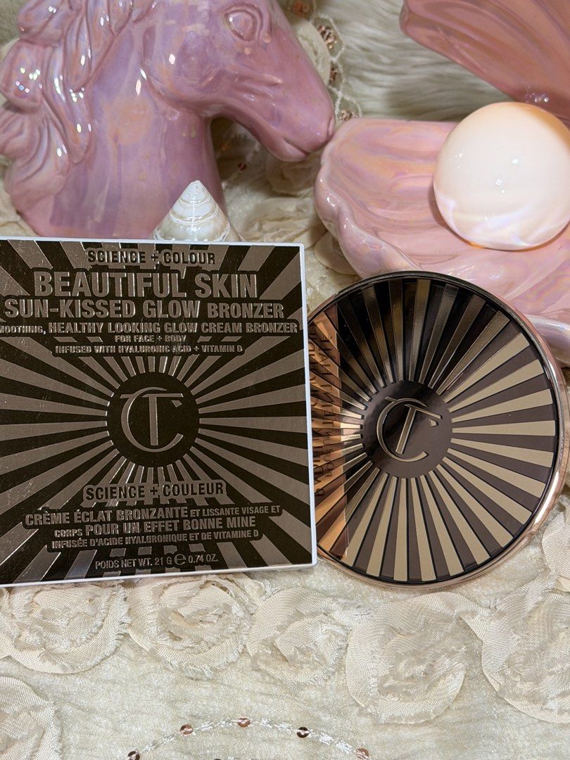 Charlotte Tilbury Beautiful Skin Bronzer - 2 Medium (Category: Makeup) located in Quezon City. Submitted by rhai_decluttering (Listing ID 1456895219, Image 2). Description: - Charlotte Tilbury Bronzer - Shade: 2 Medium - Adds warmth and dimension to the face - Beautiful swirl pattern - Luxurious rose gold compact with mirror - Easy to blend formula.