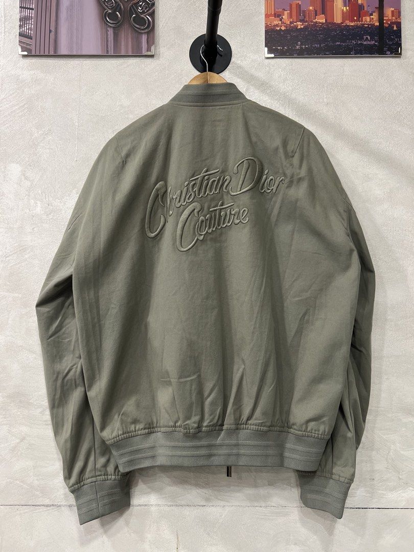 Christian Dior 24SS Cotton Blend Bomber Jacket (Category: Coats, Jackets and Outerwear) located in Manila. Submitted by -handpick- (Listing ID 1456874566, Image 2). Description: This is a Christian Dior 24SS Cotton Blend Bomber Jacket in gray featuring a prominent tonal “Christian Dior Couture” cursive embroidery on the back. Size : 50 Dimensions : Length: 28 inches Width: 24.5 inches Shoulder : 23 inches Sleeve : 25.5 inches Sign of wear in good