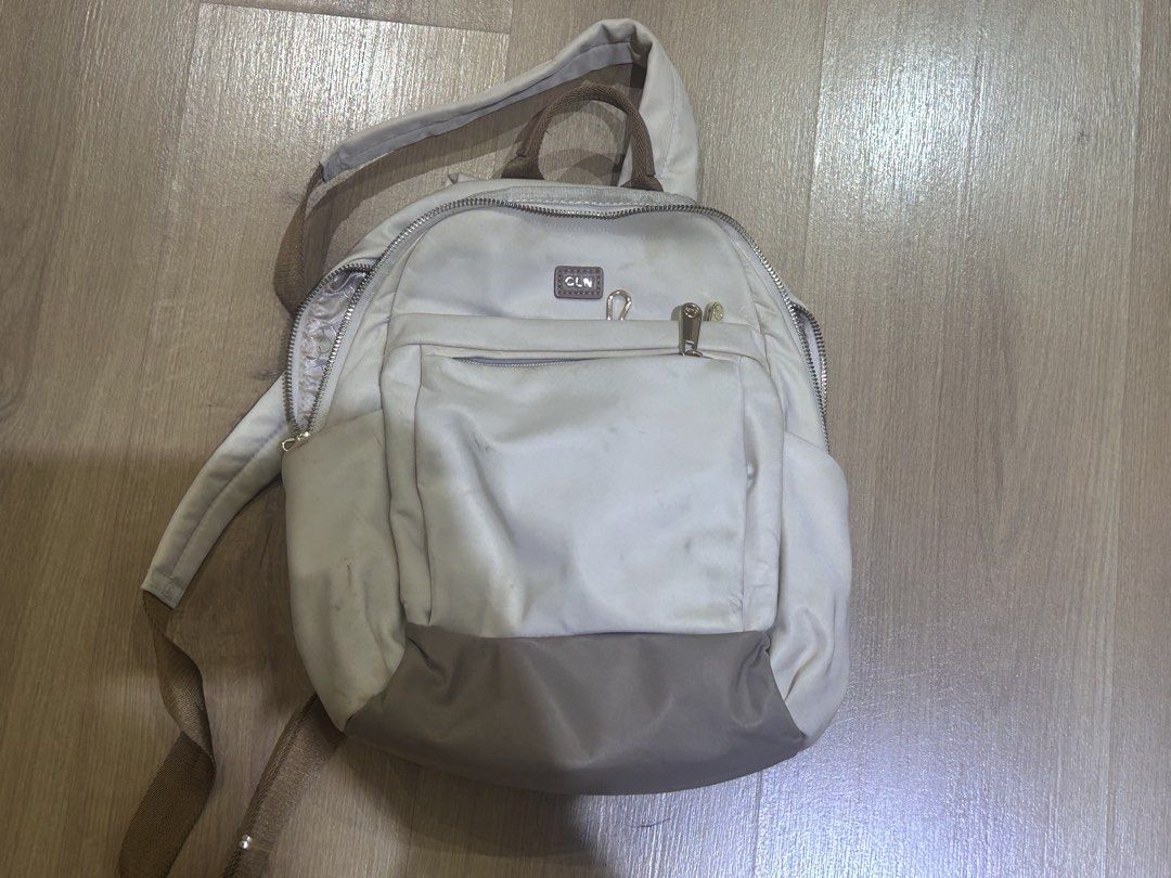 CLN Beige Backpack (Category: Backpacks) located in Mandaluyong City. Submitted by samnli (Listing ID 1456920263, Image 1). Description: Beware: has obvious signs of use, but can still be use (stains and dirty) — can clean before shipping! MOP: GCash, Maribank, BDO, GoTyme MOD: Lalamove, Grab (within Metro Manila), LBC, JNT .