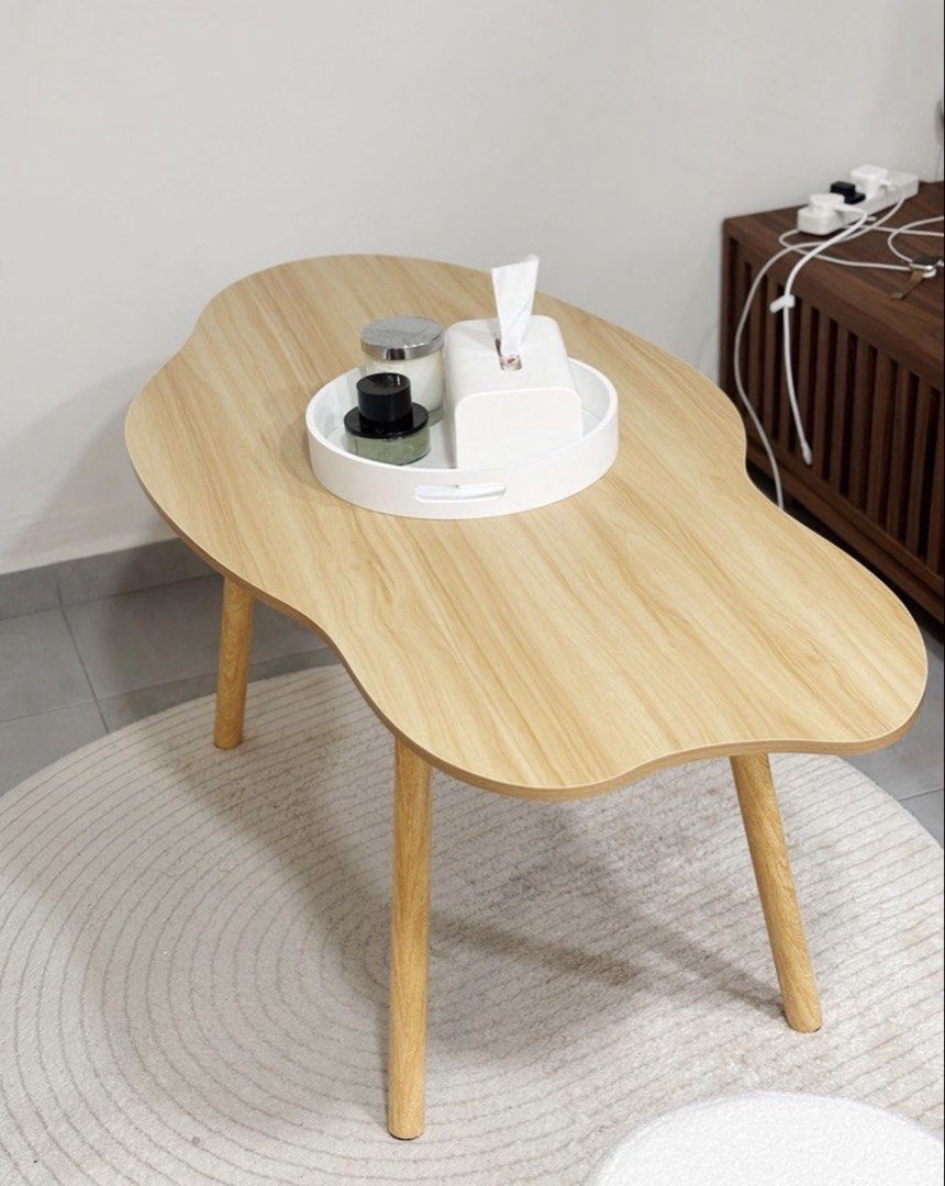 Cloud Coffee Table (Category: Tables & Sets) located in Singapore. Submitted by lookitsmong (Listing ID 1456923123, Image 1). Description: Length: 120cm (left to right) Width: 60cm (it’s cloud shape so there are curved edges) Height: 50cm Super easy to assemble, just screw in the 4 legs. No tools needed. Will remove the legs for easy pickup /transporting. Pickup at Marine Cres or I can arrange Lalamove, borne by customer 🫶🏼.