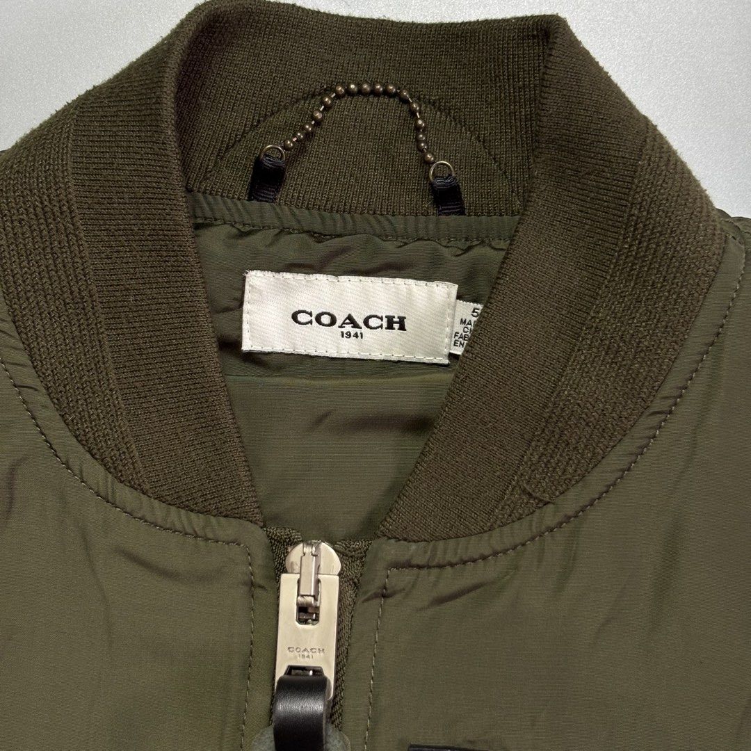 COACH 1941 MA-1 MILITARY BOMBER JACKET (Category: Coats, Jackets and Outerwear) located in Manila. Submitted by don444 (Listing ID 1456880654, Image 2). Description: COACH 1941 MA-1 MILITARY BOMBER JACKET Medium 23.5x27.5 excellent condition ₱1,500 📍North Caloocan.