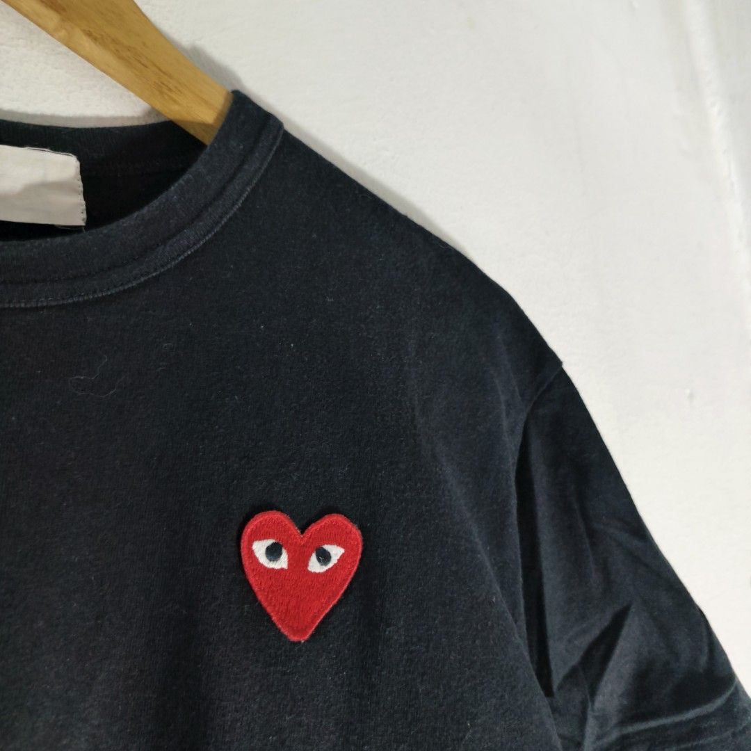 Comme Des Garcons Play Heart Patch T-Shirt (Category: Luxury Apparel) located in Antipolo. Submitted by soon2byours_ (Listing ID 1456914642, Image 3). Description: Dimensions (laid flat): ‎Pit to Pit: 18½" ‎Length: 26¼" ‎[Medium on tag] ‎ ‎Flaws: need rewash (due to long-term storage) ‎Color Rate: 10/10 ‎Condition: EXCELLENT ‎ ‎COLOR MAY VARY DUE TO LIGHTING!.