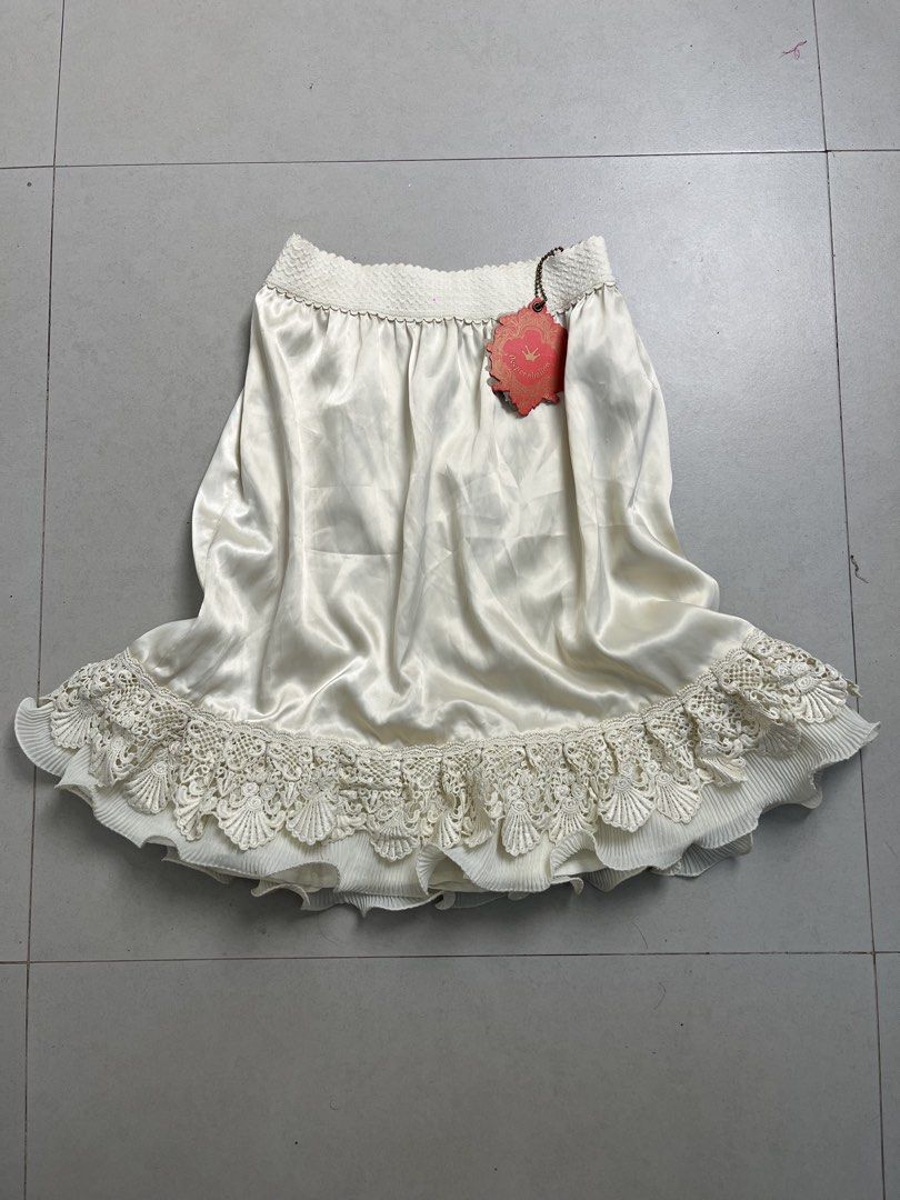 Coquette satin frilled skirt (Category: Skirts) located in Caloocan City. Submitted by onlyfromthepast (Listing ID 1456946634, Image 1). Description: Brandnew with hangtag Number 2 on tag stretchable gartered waistline ✅My bio before purchasing tia💕 ✅ All items are fresh from bales, Pls expect dirt,dust or stains.
