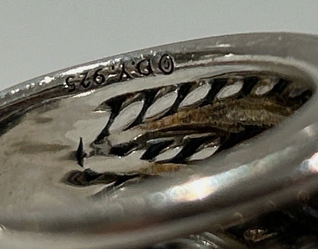 David Yurman Sterling Silver Ring .925 (Category: Rings) located in Caloocan City. Submitted by jhaydenzy (Listing ID 1456947717, Image 3). Description: Title: Authentic David Yurman Sterling Silver Crossover Wide Band RingDescription:Selling an authentic David Yurman Wide Crossover Ring. This stunning statement piece features the classic rhythmically woven smooth and twisted cable silver strands.Material: 925 Sterling SilverHallmarks: Authentici