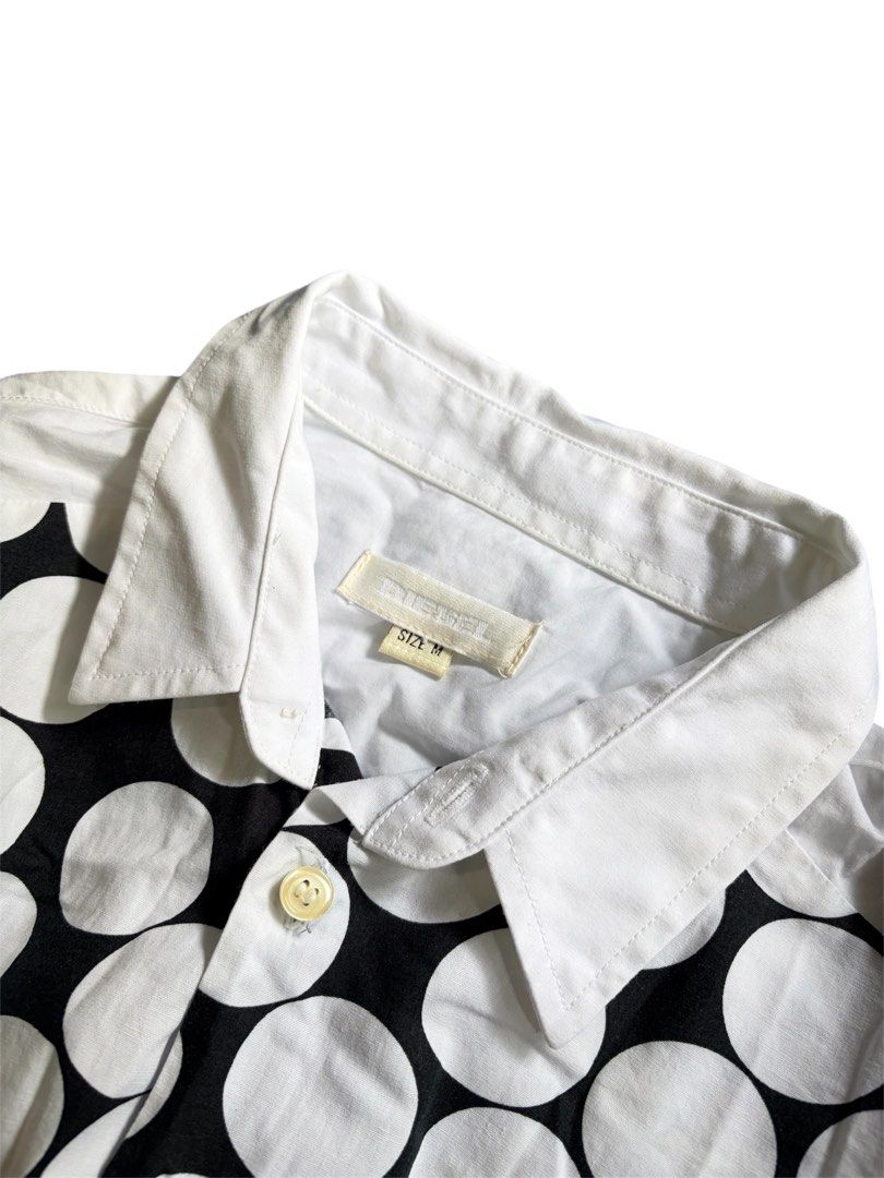 Diesel Shirt Polka Dot Panel White Button Up Size M (Category: Luxury Apparel) located in Abucay. Submitted by esangbalakalang (Listing ID 1456808873, Image 2). Description: Description: - Classic white button-up shirt - Features a stylish black and white polka dot panel on the front - Classic collar and full button closure - Convenient chest pocket - Size: Medium (M) - Versatile for casual and smart-casual occasions.