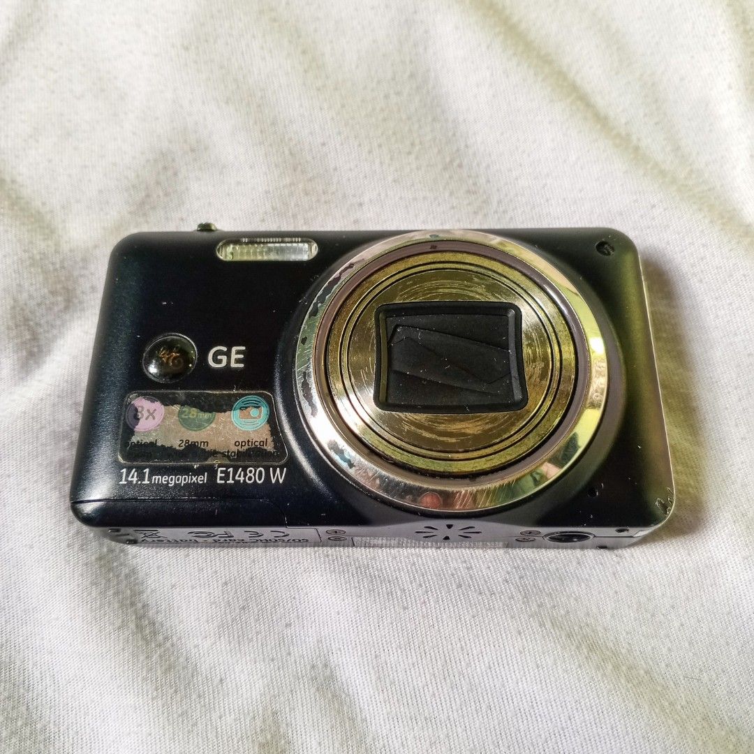 DIGICAM GE 1480W (Category: Cameras) located in San Mateo. Submitted by medyo.hobby.shop (Listing ID 1456856968, Image 2). Description: GE E1480W PRICE: ₱1,800 INCLUSIONS - UNIT ITSELF - BATTERY - CHARGER - SD CARD SPECS - WORKING FLASH, ZOOM, BUTTONS - 14.1 MEGAPIXELS - 8x OPTICAL ZOOM - MODES: AUTO, MANUAL, PANORAMA, SCENE (WITH 12 TYPES), MOVIE MODE CONDITION/ISSUE - NAG-P-PURPLE LIGHT MINSAN SA SCREEN THEN YUNG FLASH REFLECTING OFF HIGHLY REF