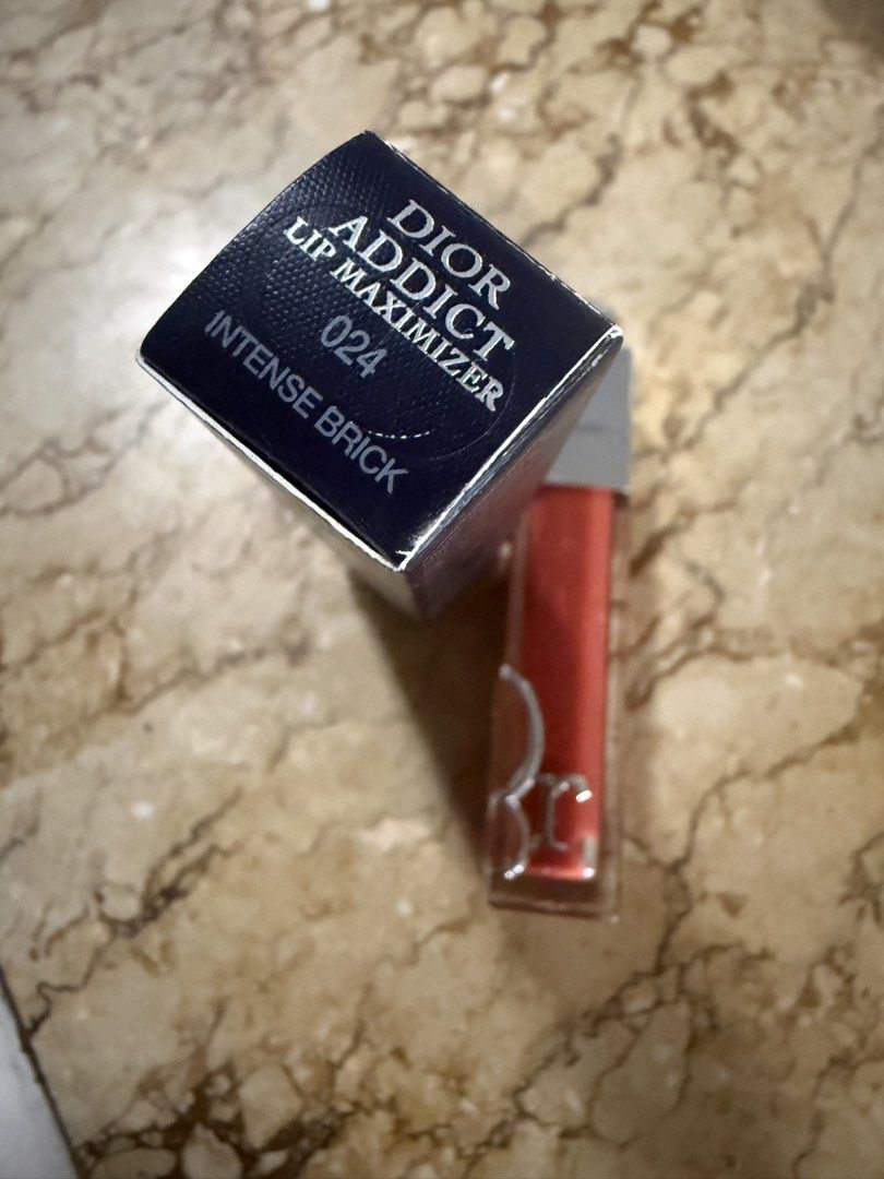 Dior Addict Lip Maximizer Gloss 024 Intense Brick (Category: Makeup) located in Angeles City. Submitted by migs_font29 (Listing ID 1456923531, Image 2). Description: - Dior Addict Lip Maximizer - Shade: 024 Intense Brick - Plumping gloss for maximum hydration - Instant and long-lasting volume effect - Beautiful brick red shade with shimmer - Comes with original packaging.